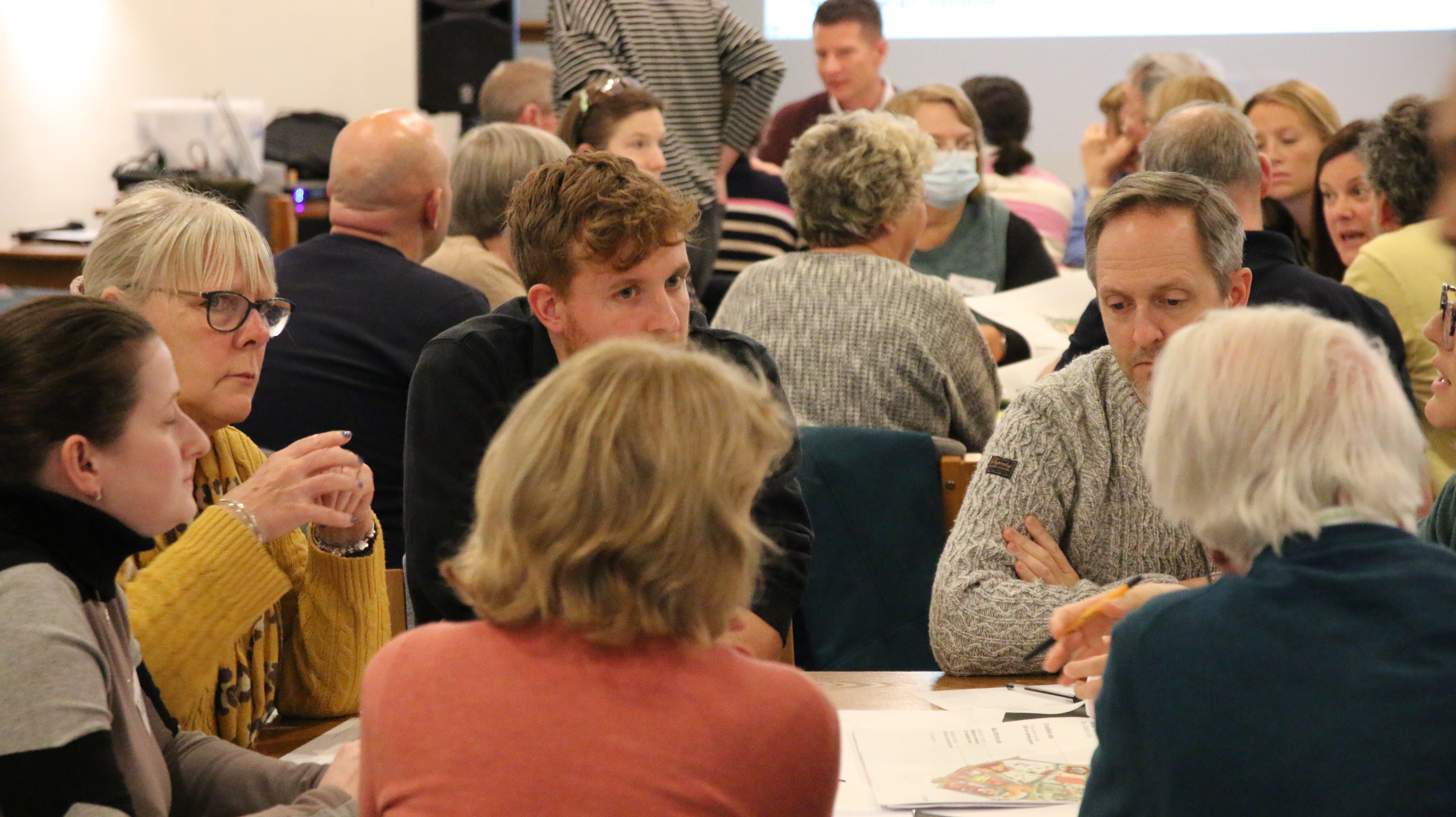 A photograph of members of the Citizens' Assembly discussing the options